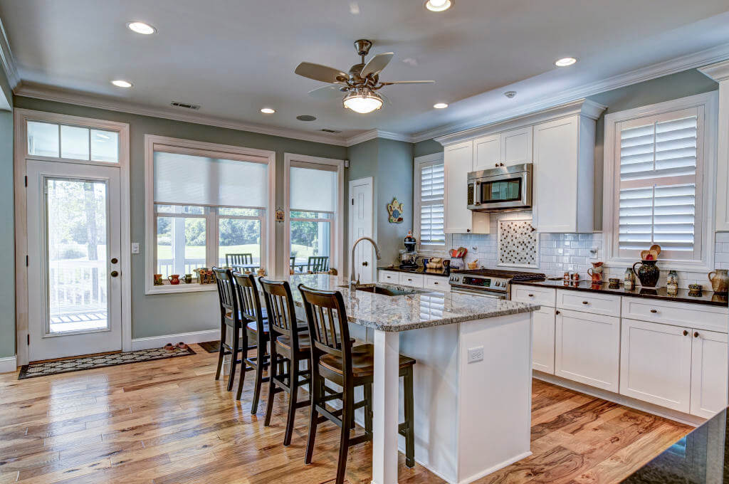 elitelivingconstruction beautiful kitchen interior with white cabinets.jpg
